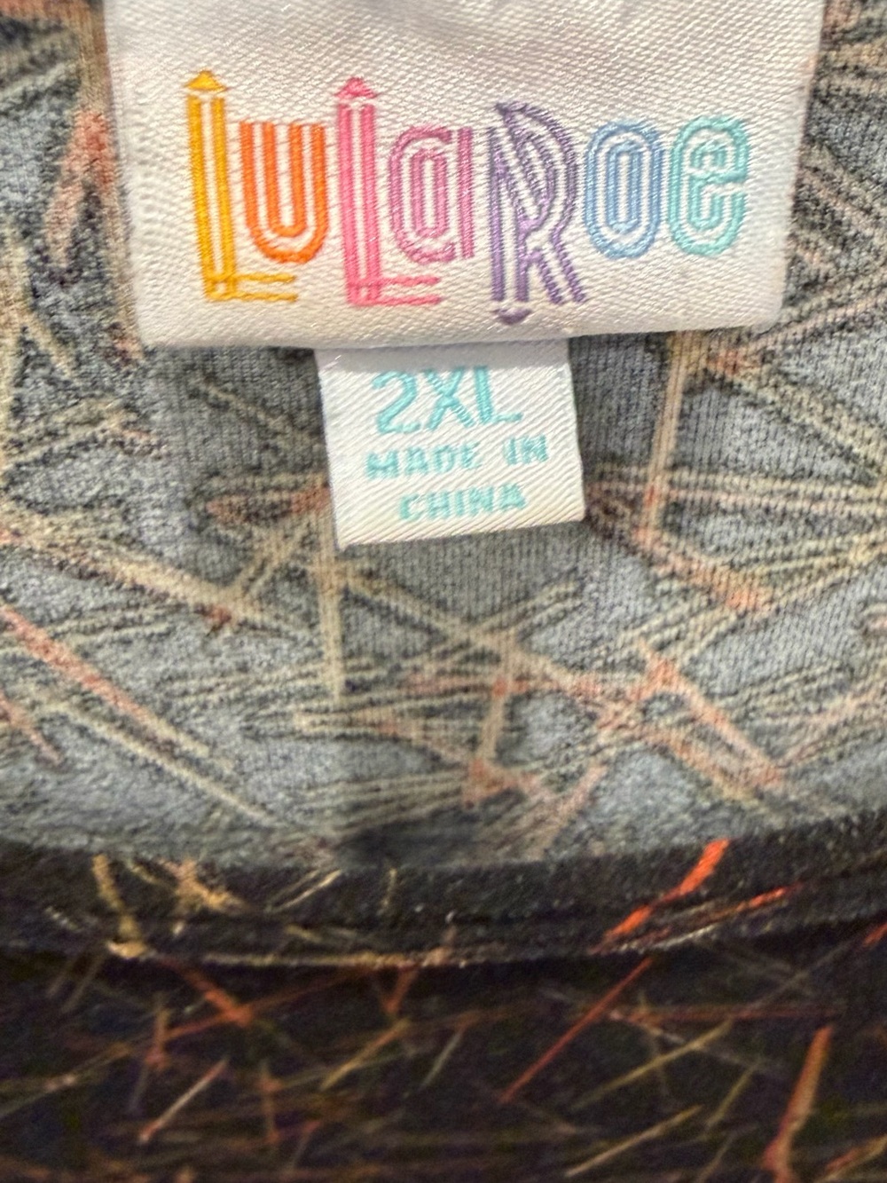 LuLaRoe Black Tunic with Rust & Olive Stitch-Style Print - Picture 2 of 4